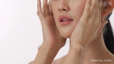 闭上美丽的年轻亚洲妇女的肖像感人的脸和健康的皮肤慢动作护肤理念.